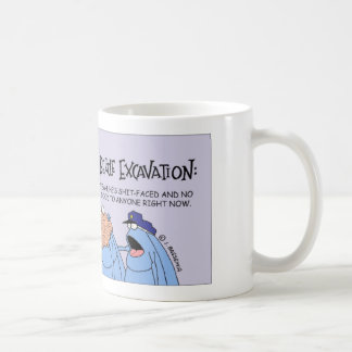 Dyngaskalbagge på utgrävningplatsen kaffemugg