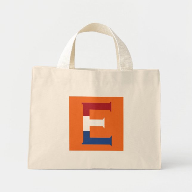 E Monogram täckt av NLD-Flagga på eller under Mini Tygkasse (Framsidan)