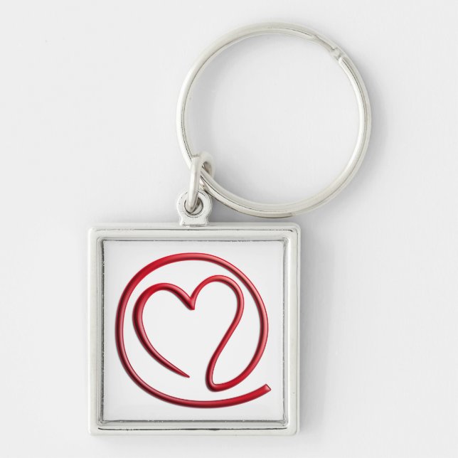 eA i l 4 y o Fyrkantig Silverfärgad Nyckelring (Framsidan)