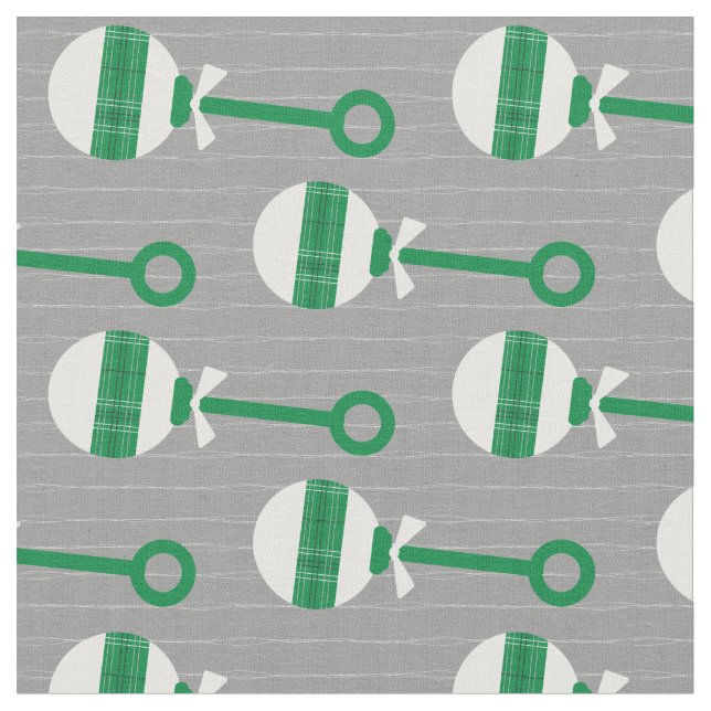 Eagles Grönt Plade Baby Rattle på Grått Tyg (Närbild)