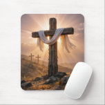 Easter Crosses On a Hill Musmatta<br><div class="desc">A central wooden cross,  covered with a white cloth and illuminated by the warm glow of the setting sun,  stands out against two additional crosses on a rocky hillside in the background</div>