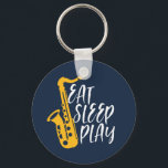 Eat Sföreliggande Play-Coola Saxophone Player Jazz Nyckelring<br><div class="desc">Vintage retro orchestra och jazz Music fläkt är utformade för dem som spelar fiolin och saxofon i ett musikband eller en symfoni. Coola klassisk jazz-handel för saxofonist, violinist, musiker och konstnär. Lustigt och humoristiskt musikpun för violin- och saxofonlärare, orkstra fläkt och de som bara har kärlek musik. Underbar souvenir, julklapp...</div>