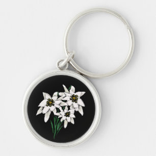 Edelweiss blommor rund silverfärgad nyckelring