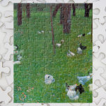 Efter regnet, Garden Chickens av Gustav Klimt Pussel<br><div class="desc">Efter Rain (Garden with Chickens in St. Agatha) (1899) av Gustav Klimt är en vintage av Viktorian Era bra landskapsmålning. En naturområde med kycklingar på bakgården, fält, som äter gräs på en gård med träd i bakgrunden. Om konstnären: Gustav Klimt (1862-1918) var en österrikisk symbolmålare och en av de mest...</div>