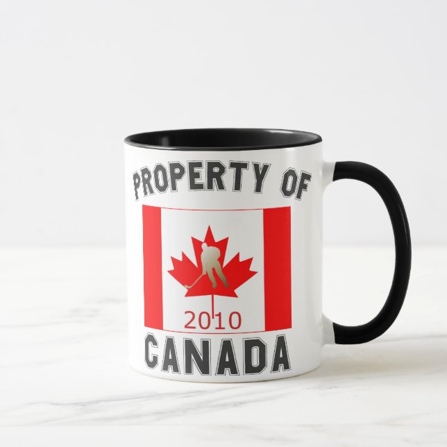 Egendom av souvenir 2010 för Kanada hockeyflagga Mugg (Höger)