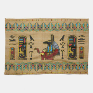 Egyptisk Anubis prydnad på papyrusen Kökshandduk