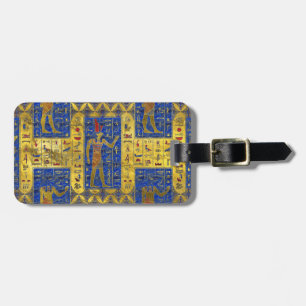 Egyptiska guld- symboler på den Lapis lazulien Bagagebricka