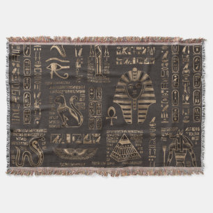 Egyptiska hieroglyfer och gudom-guld på trä filt