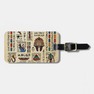 Egyptiska hieroglyfer och gudom på papyrus bagagebricka