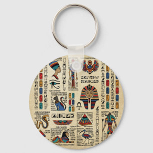 Egyptiska hieroglyfer och gudom på papyrus nyckelring