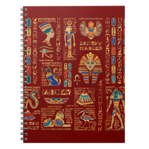 Egyptiska hieroglyfer och gudom på rött anteckningsbok