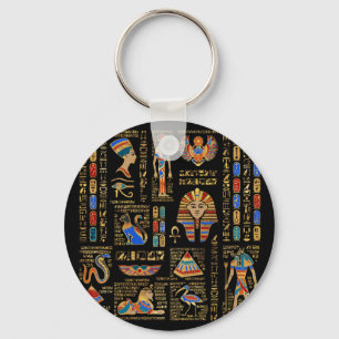 Egyptiska hieroglyfer och gudom på svart nyckelring