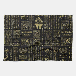 Egyptiska hieroglyphs och gudomar som är guld- p kökshandduk