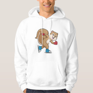 ekorre vid isar som är i sittande med isskiffer hoodie