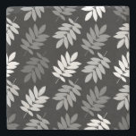 Elder Leaf Pattern Black White Grey Stenunderlägg<br><div class="desc">Elder tree leaf silhouette in a surface pattern design with grey and white detail on a black background.</div>