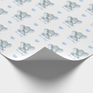 Elefant som slår in papper (personifierade blått presentpapper