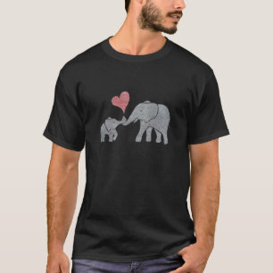 Elefantkramar grånar mamman och babyen med röd tee shirt