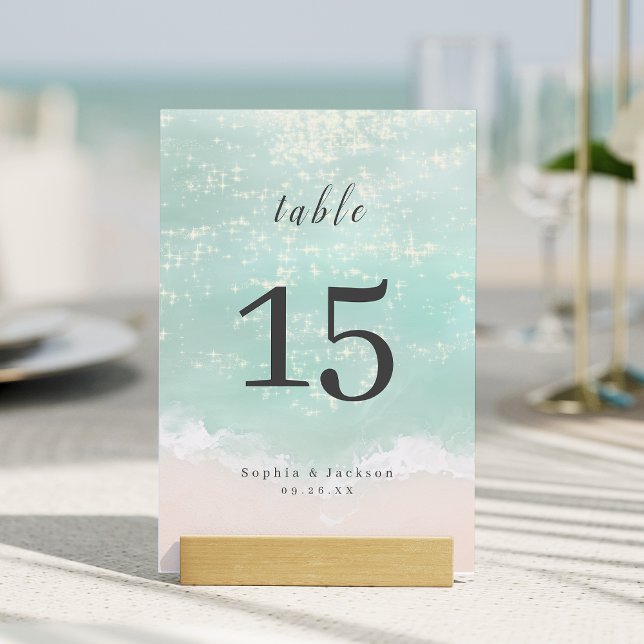 Elegant abstrakt mousserande havsstrandbröllop bordsnummer (Elegant abstract sparkling ocean beach wedding table number)