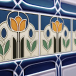 Elegant Art Nouveau Tulip Ceramic Tile Kakelplatta<br><div class="desc">Capture the refined beauty of the Art Nouveau period with this elegant ceramic tile. The design features a perfectly symmetrical and stylized tulip, rendered in a warm apricot-orange hue that beautifully contrasts with the deep royal blue background. The central flower is flanked by graceful budding forms and sage green leaves,...</div>