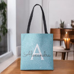 Elegant av Aqua Teal Blue Gnistra Monogram Bok Bag Tygkasse<br><div class="desc">Aqua Teal Ice Blue Faux Gnistra och Glitter Elegant Monogram Bok Bag. Den här Bok-sidan kan anpassas så att den omfattar ditt första och första namn.</div>