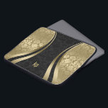 Elegant Black and Guld Damasker Dynamic Rand Laptop Fodral<br><div class="desc">Elegant guld-toner och blommigt för svart vintage dämpar kombinationen med guld dynamiska linjer-accenter och anpassade monogram.</div>