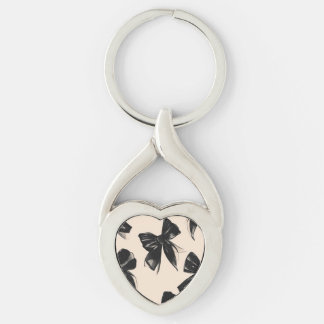 Elegant Black Bow Mönster iphone case Twisted Heart Silverfärgad Nyckelring