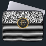 Elegant Black Leopard Monogram Laptop sleeve<br><div class="desc">Ett svart och vitt leopard mönster med en svart och vit stripe och ett monogram för guld och svart elegant dekorerar detta laptop sleeve. Anpassa den för dig själv eller för en gåva! Designad av Blackberry Boulevard.</div>