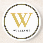 Elegant Black och Guld Monogram första Namn Underlägg<br><div class="desc">Personlig Monogrammed underlägg i klassisk svart och guld. Anpassa med ditt första monogram för brev och namn i familjen.</div>