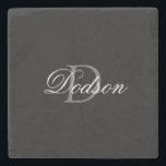 Elegant Black Script Monogram Stenunderlägg<br><div class="desc">Elegant Black Script Monogram Stone CoasterUtformad med fet svart anpassade och lätt grått monogram från början på mitten.  Personlig med efternamn i det moderna elegantens vita skript.  Gör en underbarare presentidé för alla tillfälle.
KLICKA PÅ PERSONALISERA MALL OCH ANGE NAMN OCH MONOGRAM</div>