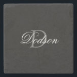 Elegant Black Script Monogram Stenunderlägg<br><div class="desc">Elegant Black Script Monogram Stone CoasterUtformad med fet svart anpassade och lätt grått monogram från början på mitten.  Personlig med efternamn i det moderna elegantens vita skript.  Gör en underbarare presentidé för alla tillfälle.
KLICKA PÅ PERSONALISERA MALL OCH ANGE NAMN OCH MONOGRAM</div>