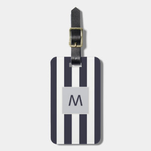 Elegant blåttvit görar randig monogramen bagagebricka