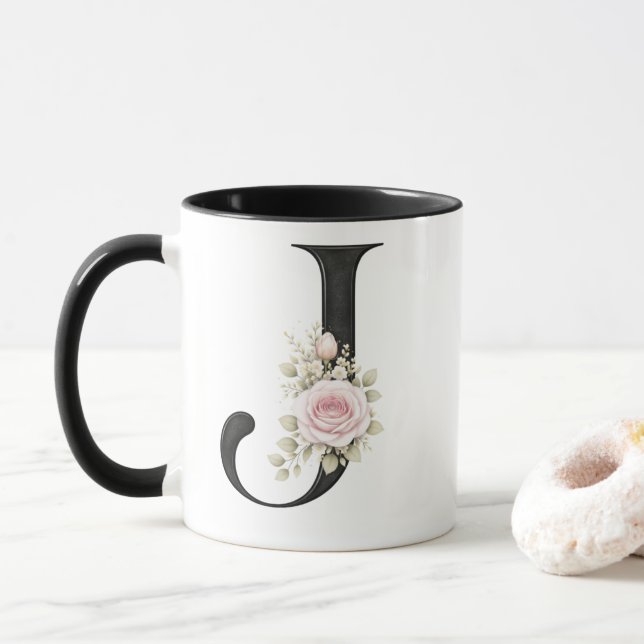 Elegant blomstergrafisk logotyp med bokstaven J Mugg (Med munk)