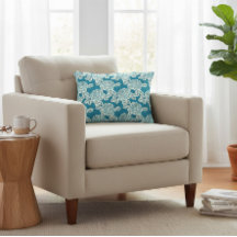 Elegant blomsterkudde med vintage charm