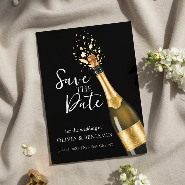 Elegant Champagne Spara datum Bröllop Inbjudningar (An elegant black and gold Save the Date design featuring a popping champagne bottle)