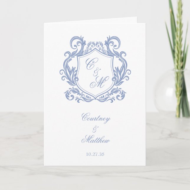 Elegant dammig blå monogram vapensköld bröllop program (Framsida)