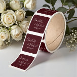 Elegant Deep Burgundy Script Minimalist Wedding Fyrkantigt Klistermärke<br><div class="desc">Add a sophisticated flair to your wedding stationery with our Elegant Deep Burgundy Script Minimalist Wedding Square Sticker. These stickers can be customized with the names of the bride and groom,  making them a beautiful keepsake of your special day. Perfect for use on envelopes,  favors,  or other wedding details.</div>