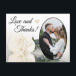 Elegant Elfenbenskusten Vit ros Bröllop Kärlek och Vykort<br><div class="desc">Detta vackra vykort är ett enkelt men tänkvärt sätt att tacka gästerna i bröllop. Den har en underbar design med ditt foto från bröllop i ett ovalt format ram och ett enda långt härdat elfenben eller vit ros som reflekterar i bassäng i vatten. Bildtexten lyder "Kärlek och tack" och det...</div>