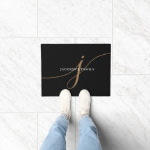 Elegant enfärgad svart och guld scriptmonogram