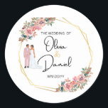 Elegant Floral Wedding Sticker Runt Klistermärke<br><div class="desc">Celebrate your special day with this elegant floral wedding sticker featuring a modern bride and groom illustration. Set within a chic geometric gold frame and adorned with watercolor pink flowers, this personalized wedding label is perfect for sealing envelopes, wedding favors, invitations, or thank-you cards. Ideal for couples like Olivia and...</div>