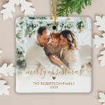 Elegant Gold Script Family Photo Merry Christmas   Julgransprydnad Keramik<br><div class="desc">Elegant Gold Hand Lettered Script "Merry Christmas" Family Photo Ornament. Features  a family photo template,  "Merry Christmas" calligraphy text in handwritten script in faux gold and family name and year. Easy to personalize it. Photo tip: crop your photo to square form before upload it.</div>