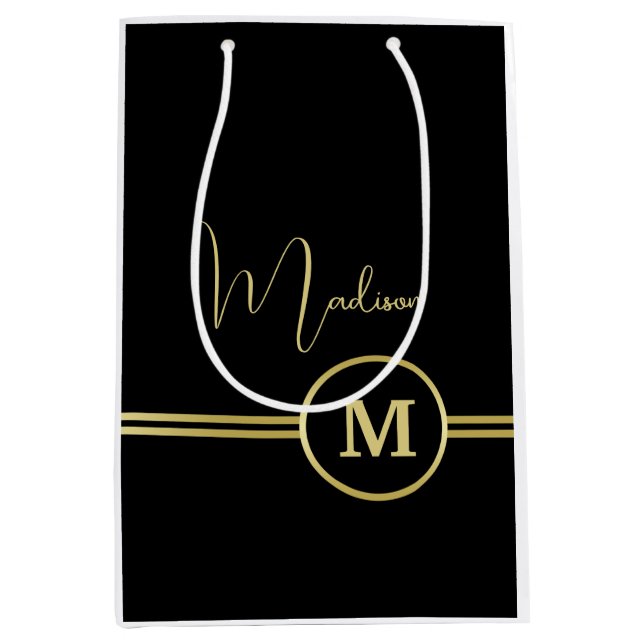 Elegant Gold Signature Monogram on Black (Framsidan)