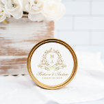 Elegant Guld Blommigt Vapensköld Monogram Bröllop Runt Klistermärke<br><div class="desc">Tillsätt en lyxfri och tidlös beröring till bröllop med dessa monoklippor för vapensköld av guld, som innehåller parets initialer som är inramad av en botanisk design av elegant guld. Med namn och bröllop-datum i sofistikerad kalligrafi är dessa klistermärken perfekter för förslutning av kuvert, för att lägga till favoritpåsar eller för...</div>