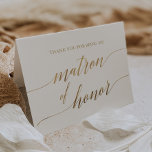 Elegant Guld Calligraphy Matron of Honor Tack Kort<br><div class="desc">Guld kalligrafitemran i elegant,  som du vill tacka för,  är perfekt för ett enkelt bröllop. Neutraltens utformning har ett minimalistiskt kort som är dekorerat med romantisk och vismisk faux-folie guld typografi. Obs! Den här designen har inte äkta guld-folie. Det är en grafik av hög kvalitet som framställs som guld-folie.</div>