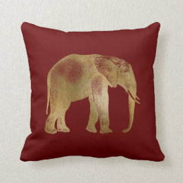 Elegant guld elefant på vinröd bakgrund kudde
