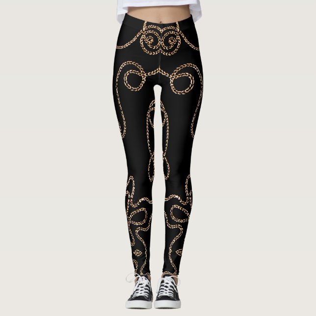 Elegant guld präglas av svart leggings (Framsida)