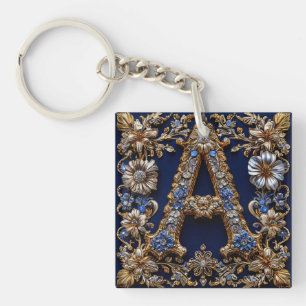Elegant gyllene bokstav "A" med utsmyckad blomster
