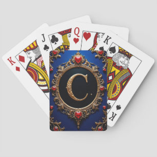 Elegant gyllene bokstav C omgiven av hjärtan Casinokort