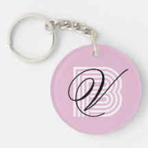 Elegant i den moderna rosan i monogram-nyckelkedja