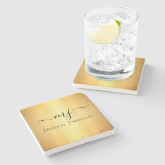 Elegant initialer vid guld stenunderlägg