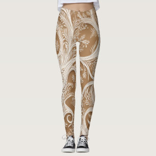 Elegant invecklad vit design på mellanbruna leggin leggings